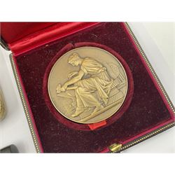 Three parker fountain pens, one example with 14ct gold plated cap and personal engraving, in Parker 51 box, together with a silver Sampson Mordan Everpoint propelling pencil with personal engraving and a silver cased fountain pen with 14ct gold nib and a souvenir bronze Dollfus-Mieg medallion, awarded to John G Sedorski, in fitted case 