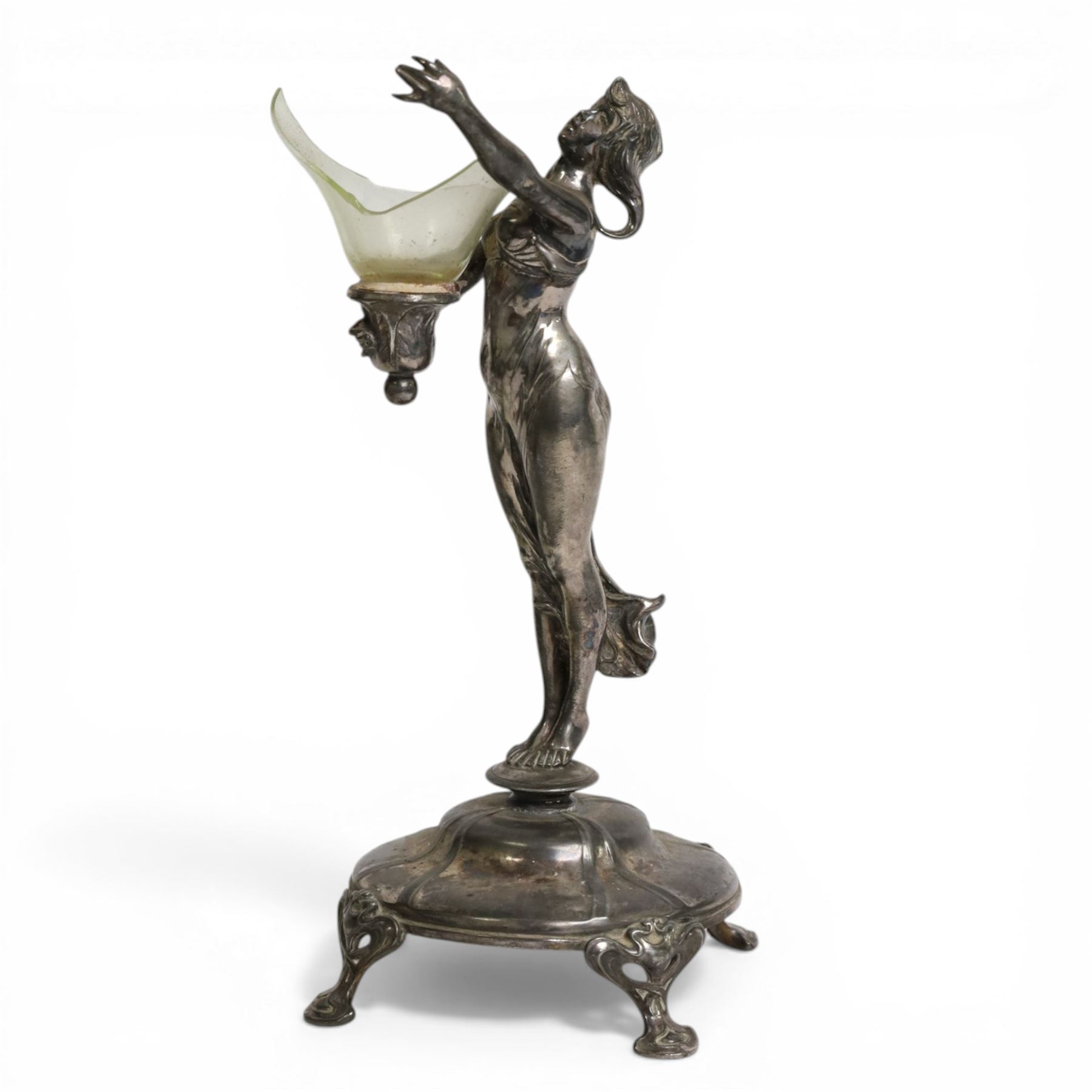 Art Nouveau pewter centre piece, modelled as a female figure upon a circular base raised  on four whiplash feet (a/f),  H28cm 
