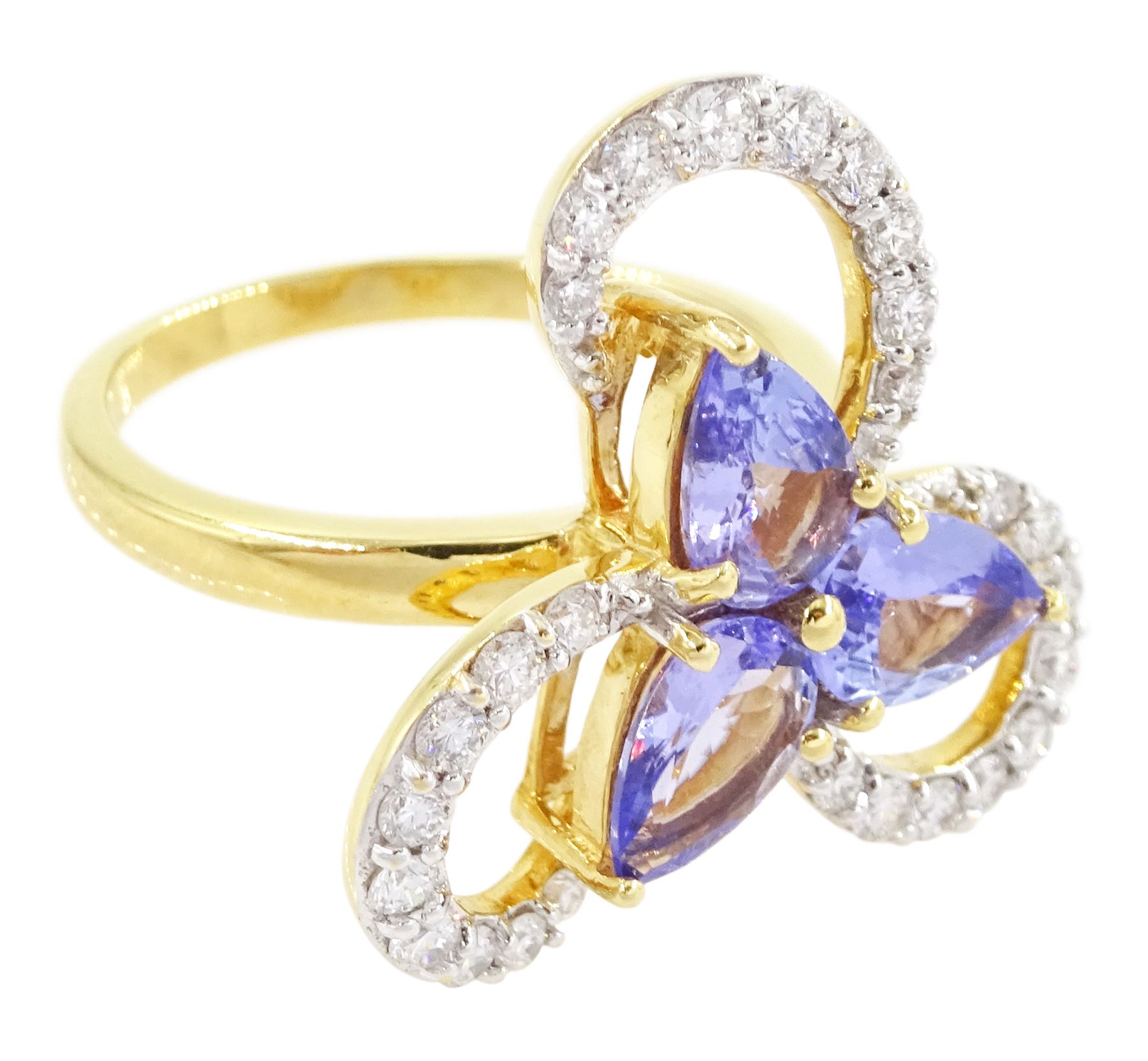 18ct gold tanzanite and diamond cluster ring, three pear cut tanzanite's, with round brilliant cut diamond surround, in an openwork swirl setting, hallmarked, total tanzanite weight 1.50 carat, total diamond weight 0.55 carat, with World Gemological Institute Report