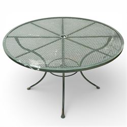 Green painted wrought metal garden table and chairs, with green striped cushions 