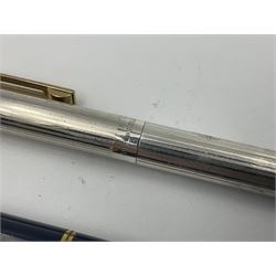 Sheaffer Targa 1011 Diamond Square fountain pen, the gold plated barrel with nib stamped 14K 585, together with another Sheaffer Targa fountain pen with blue barrel and gold nib stamped 14K 585 and matching ballpoint, and Sheaffer ballpoint pen with sterling silver barrel, largest L13.5cm (4)