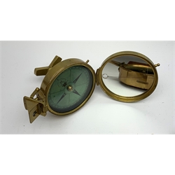 Brass Natural Sine type compass with spirit levels to the dial, bears name of Stanley, D8cm, in earlier mahogany box; brass pocket sextant of drum shaped form, the screw top marked Stanley London; small brass cased compass with pedestal tripod base; and Glass Developments Ltd. hahogany and brass spirit level L31cm (4)