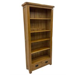 Light oak open bookcase, fitted with two drawers