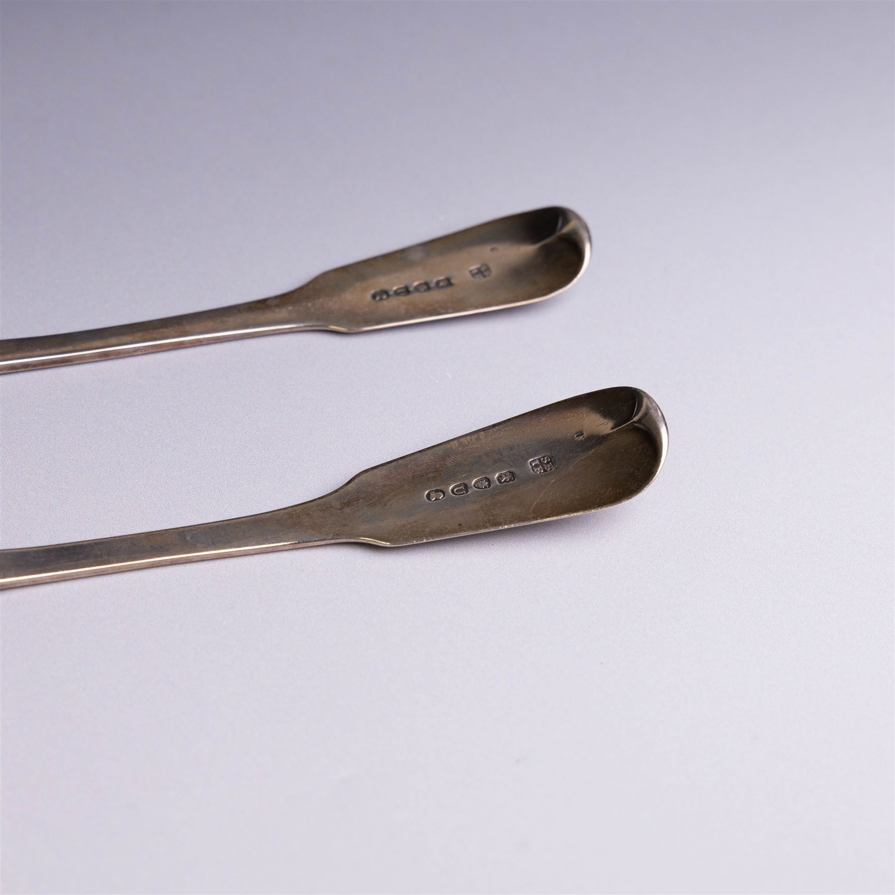 Pair of George III silver Fiddle pattern table spoons, each with bright cut floral and foliate decoration, hallmarked Sarah & John William Blake, London 1815