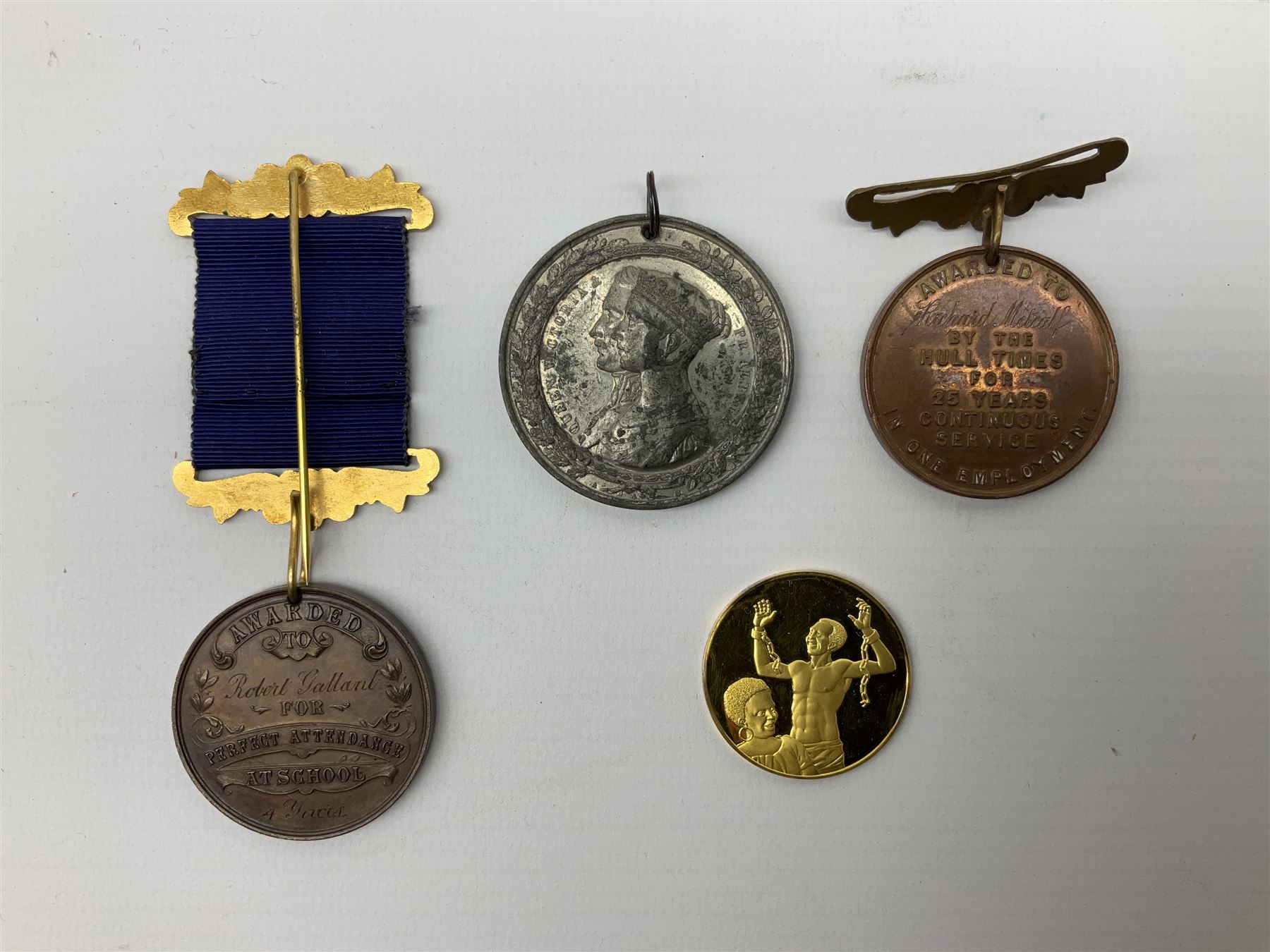 Wilberforce and the Slave Trade silver gilt medallion. First edition No.369; Hull Times bronze Long Service Medal; Hull Education Committee bronze school attendance medal; and a silvered medallion to Commemorate Queen Victoria's Visit to Hull Oct.14 1854; all uncased (4)
