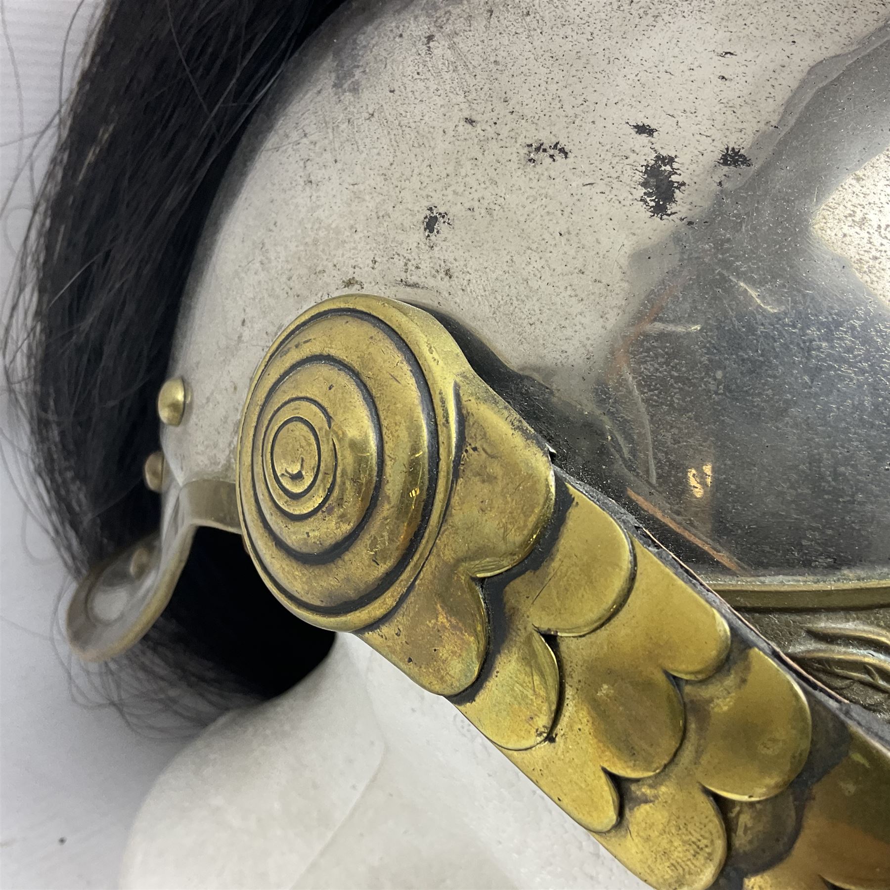 French 1874 Pattern Dragoon trooper's helmet with original liner and extra long criniere; stamped 10 DR with other numbers and Alexis Godilllo to the back of the helmet