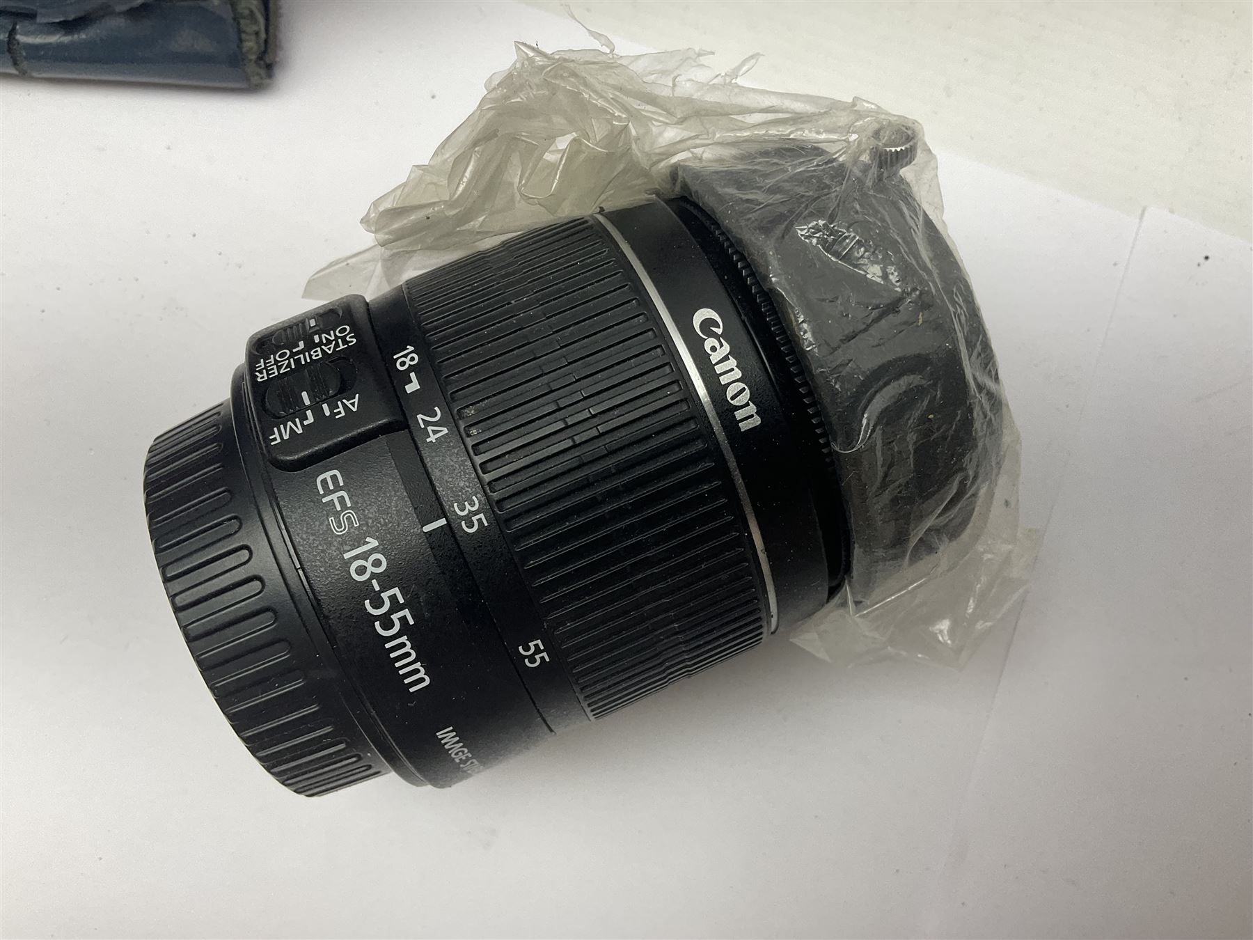 Cameras and accessories, to include Olympus OM101 Power Focus camera body, serial no 1076067, with 'Sigma AF Zoom 1:38, f=75 200mm' lens, serial no 2053714, Canon EOS 5000 camera body, serial no 1507812, with 'Canon Zoom EF 80-200mm, 1:4.5-5.6' lens, other cameras, by Miranda, Coronet and Ricoh and a collection of lenses, carry cases, etc 