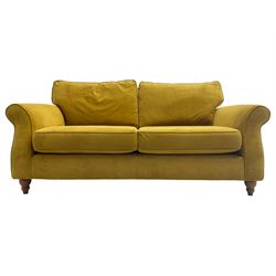 Next Furniture - traditional shaped three-seat sofa, upholstered in mustard velvet, rolled arms with pipping, on turned front feet