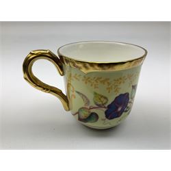 Royal Worcester cabinet cup and saucer, decorated with Samuel Astles English Flowers pattern