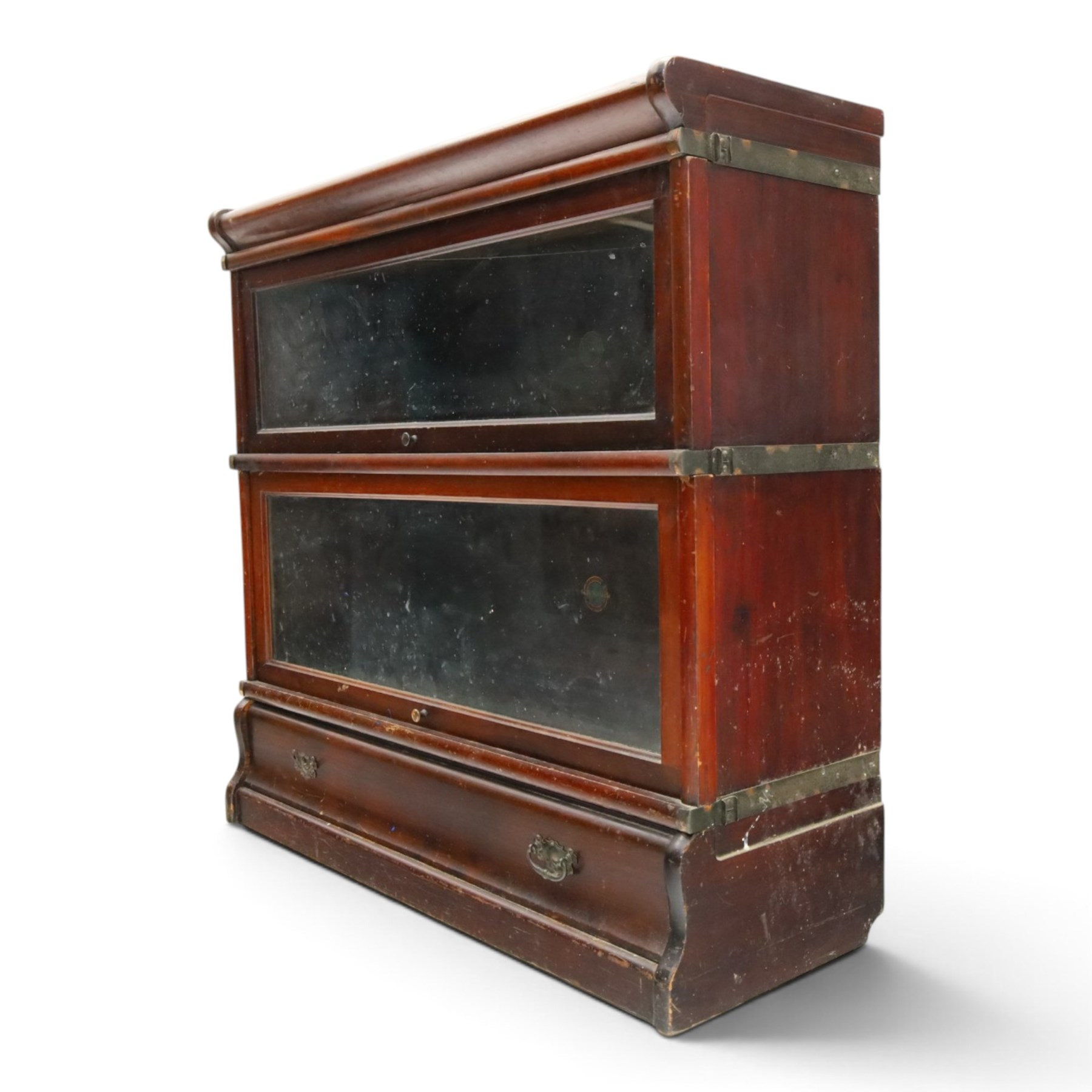 Globe Wernicke - early 20th century mahogany two-tier stacking library bookcase, fitted with glazed up-and-over doors, two drawers to the plinth base; together with a similar single-tier example (W87cm D27cm H54cm)