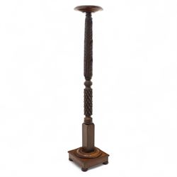 Late 20th century carved mahogany torchère stand, dished top above heavily carved column, ...
