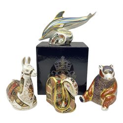 Four Royal Crown Derby paperweights, Llama, with gold stopper, Snake, with gold stopper, Honeybear, with silver stopper and Striped Dolphin, with gold stopper and box, all with printed mark beneath 