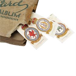 Two cigarette card albums and contents of various cards