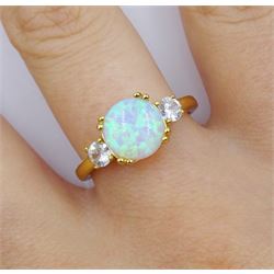 Silver-gilt three stone opal and cubic zirconia, stamped 925 