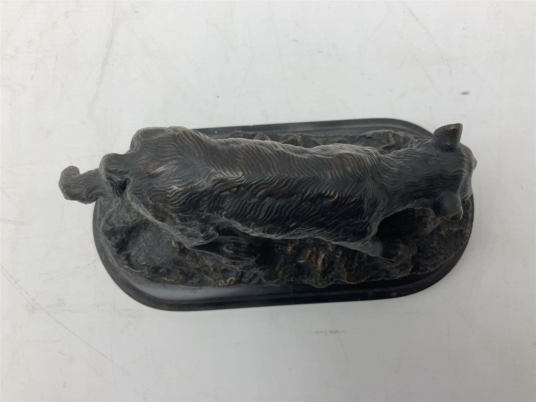 Bronze figure of a wolf with lamb prey, L18cm