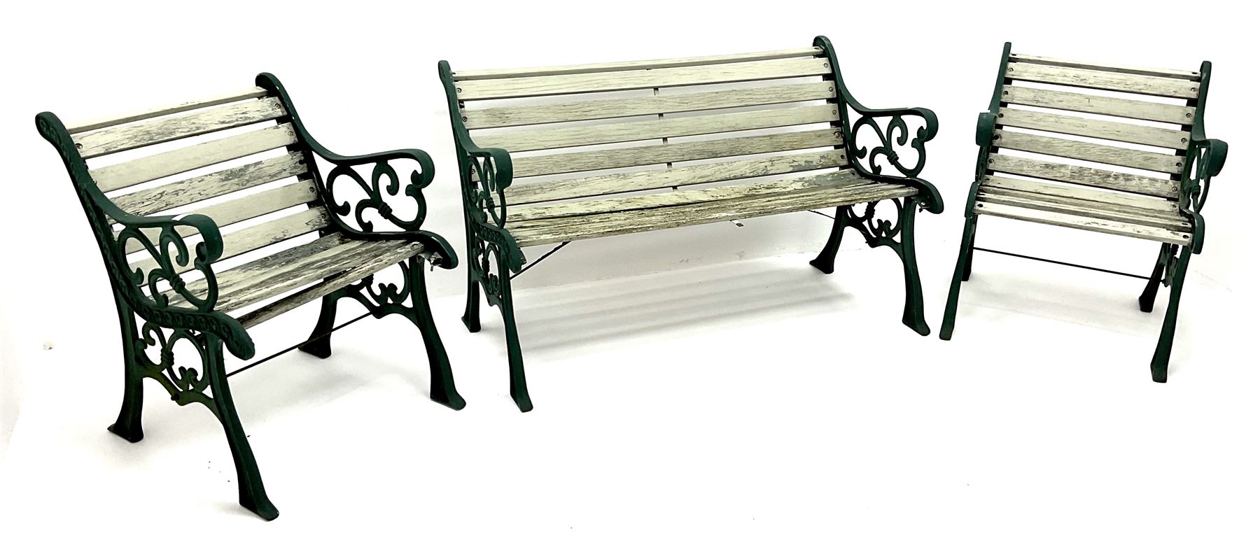 Cast iron garden bench, painted timber slats (W127cm) and pair of matching armchairs (W63cm)