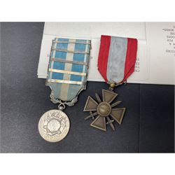 French Republic Colonial Medal with five clasps for Libye, Afrique Francaise Libre, Bir Hakeim, Koufra and Tchad; and Croix de Guerre Des Theatres D'Operations Exterieurs with three MID leaves and gold star; both with ribbons (2)