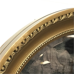 Oval gilt framed bevel edge mirror, W73cm, H57cm