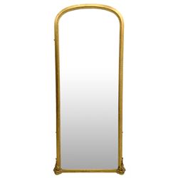Tall Victorian hall mirror, in arched gilt frame with foliate mould slip, acanthus scroll corner brackets 