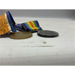 Pair of WWI medals, comprising British War medal and Victory medal, both with ribbons