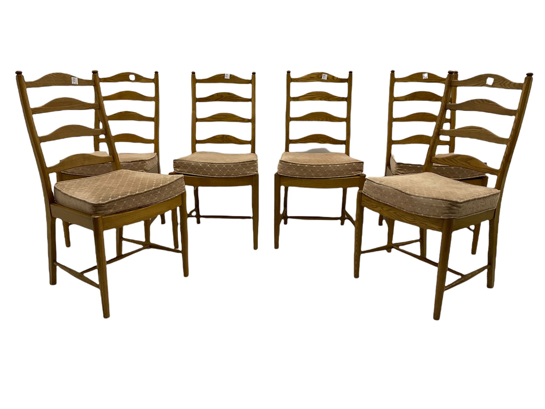 Ercol light elm oval extending dining table, with butterfly leaf, and six ladder back chairs 
