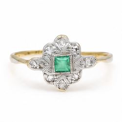 Early 20th century gold and platinum emerald and diamond panel ring, single rectangular cu...