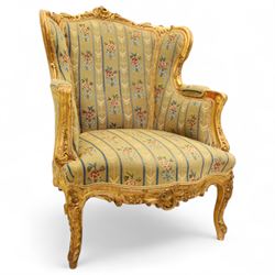French design giltwood armchair, high serpentine back with deep foliate cresting and mould...