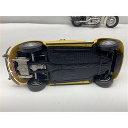 Franklin Mint - three die-cast models comprising 1:10 scale Harley Davidson Heritage Softail motorcycle, 1:24 scale 1957 VW Beetle and 1:24 scale 1993 Rolls Royce Corniche IV; all unboxed (3)
