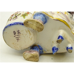  18th/ early 19th century Delft polychrome salt in the form of a seated woman and a early 20th century Delft polychrome armorial tulip vase, H26cm (2)  