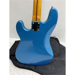 Richwood electric bass guitar in blue, cream and natural finish L117cm; in Fender soft carrying case; together with Behringer Thunderbird Bx108 amplifier date code 0 4 11.