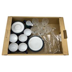 set of six Dartington champagne glasses, with an internal elongated tear in the stem, together with a set of six wine glasses and Denby regatta pattern tea wares comprising of milk jug, eight dessert plates, nine tea cups and eight saucers 