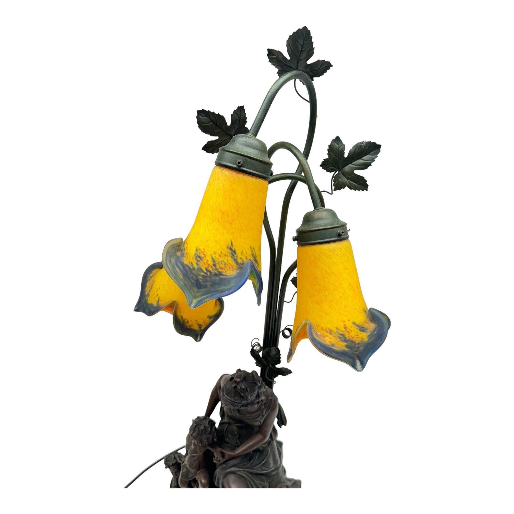 Large table lamp, the base modelled as a woman with putti and goat, with three glass shades, H90cm   