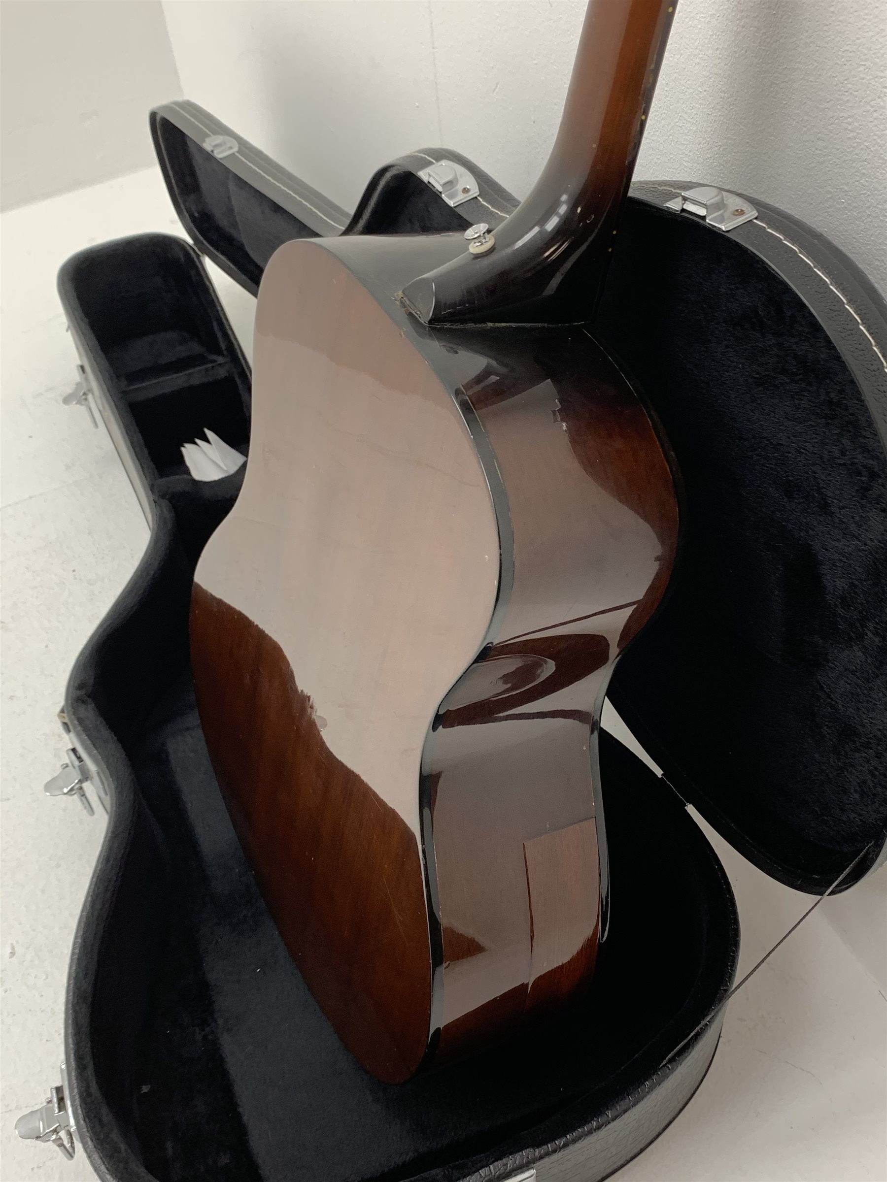 Rare Gibson Mk 35 acoustic guitar with mahogany back and sides, rosewood fingerboard, spruce top, fan-patterned bracing, nickel plated hardware and dot inlays, serial number 859651 in carrying case 