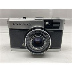 Four Olympus camera bodies, including Olympus OM10, serial no 20744269, with 'Olympus OM-System Zuiko Auto-S 50mm 1:1.8' lens serial no 3633644, Olympus OM-2 camera body serial no 460280 with 'Olympus OM-System G.Zuiko Auto-s 1:1.4 f=50mm' lens, serial no 729750, etc 