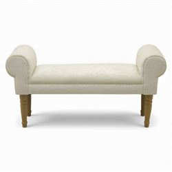 Contemporary upholstered window seat, rectangular padded seat with shallow scroll ends, upholstered in light cream fabric, raised on four turned wooden supports