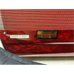 Clinkscale Crucianelli piano accordion in red pearline case with one-hundred and twenty buttons and forty-one keys L52cm; in carrying case