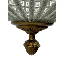 India Jane Interiors - pair of gilt metal and glass spherical ceiling light pendants, decorated with glass beads and pendants, foliage cast metal upper band, mounted by lower finial - ex-display/bankruptcy stock 