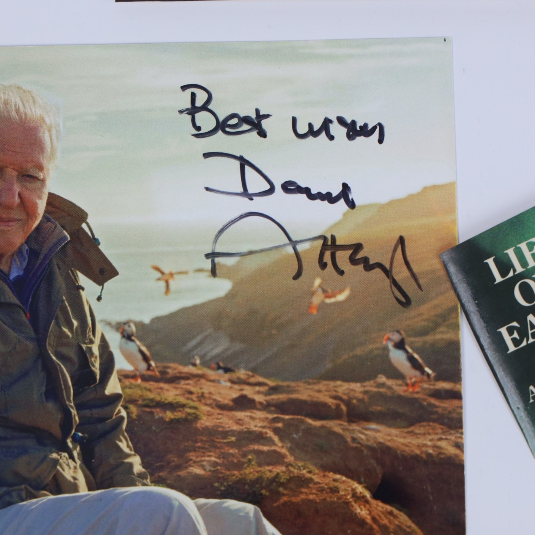 Collection of David Attenborough memorabilia, to include 'Life on Air' hardback, 'Life on Earth' hardback and framed signed photo