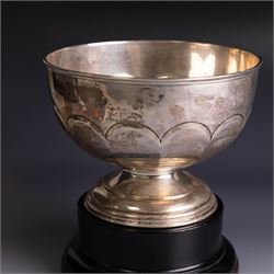 Edwardian silver pedestal bowl, of part fluted circular form, hallmarked Birmingham 1909, maker's marked worn and indistinct, upon an ebonised wooden pedestal, bowl H11.5cm