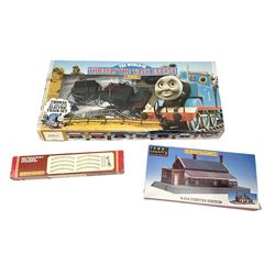 Hornby '00' gauge - The World of Thomas The Tank Engine Set; boxed; Track Pack D Twin-track Extension Set; boxed; and unassembled Dunster Station Kit; boxed (3)