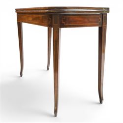 George III mahogany tea-table, the D-shaped rectangular fold-over top with satinwood stringing, raised on elegant square tapering and splayed supports with spade feet and gate-leg action