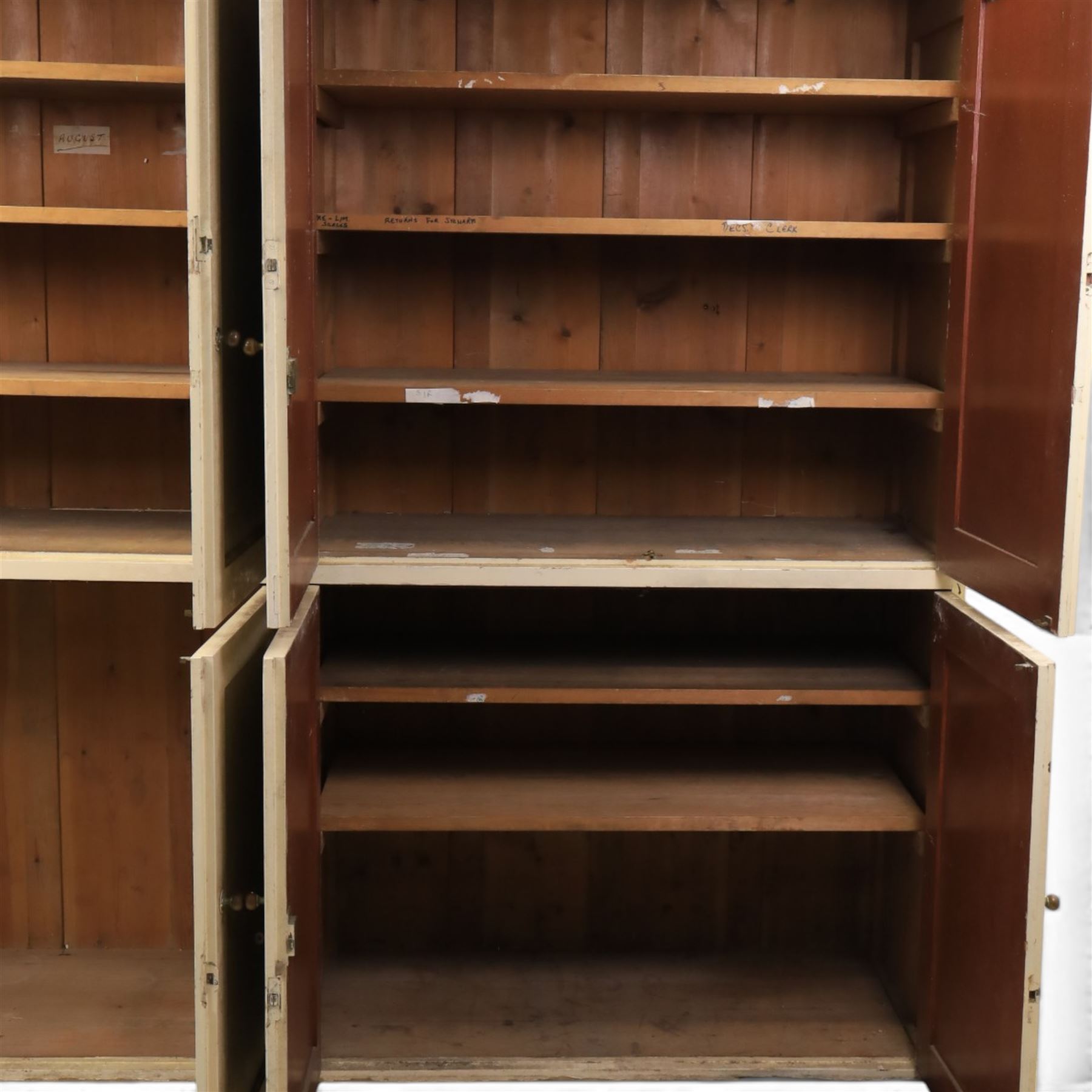 Large Georgian painted pine housekeepers cupboard, projecting cornice with four sets of twin cupboard doors with shelving enclosed