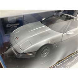 RCERTL Joyride James Bond 1:18th scale die-cast model cars - Lotus Esprit (silvered) from The Spy Who Loved Me, Aston Martin V12 Vanquish from Die Another Day and Chevrolet Corvette from A View To A Kill, all boxed (3)