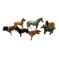 Beswick figures, comprising Afghan Hound 2285, St Bernard 'Corna Garth Stroller' 2221, Rottweiler 3056, Greatdane 'CH Ruler of Ouborough', Fox, Elephant, and dappled grey type horse. 