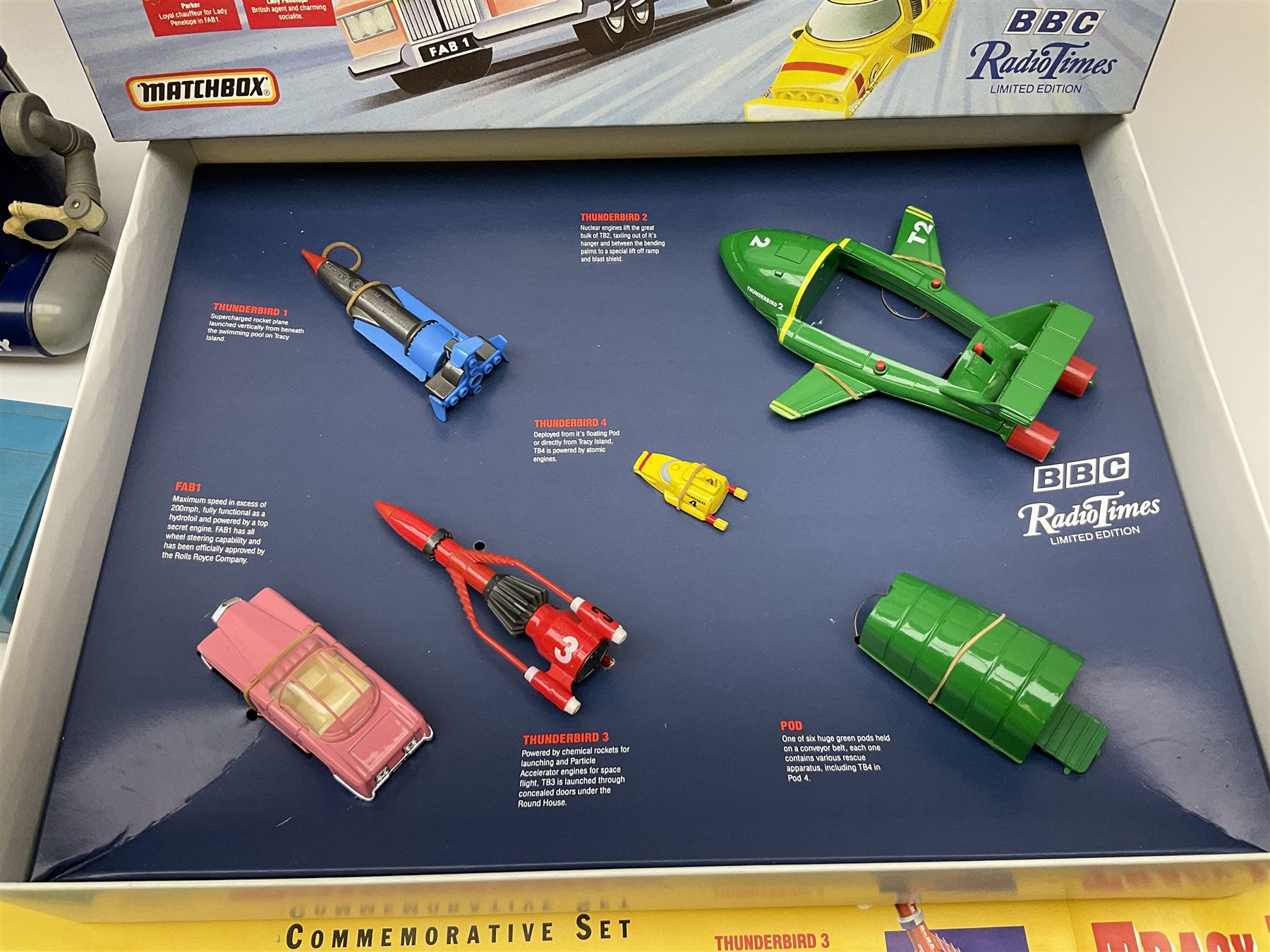 Matchbox 'The Thunderbirds' limited edition Commemorative Set, boxed with paperwork; Tomy 'Mr. D.J.' blue plastic robot radio; Mettoy Walt Disney Movie Viewer with three cassettes; and 1995 boxed set of the Star Wars trilogy VHS video tapes