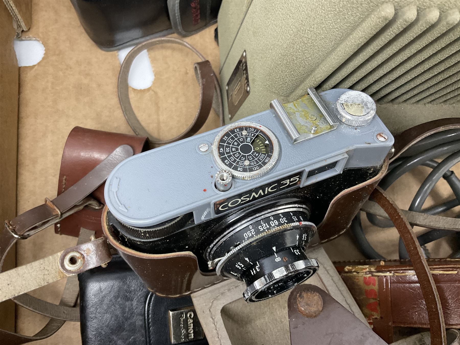 Collection of camera and equipment, to include Canon PowerShot S500, Cosmic 35, polaroid 320, etc, in two boxes  