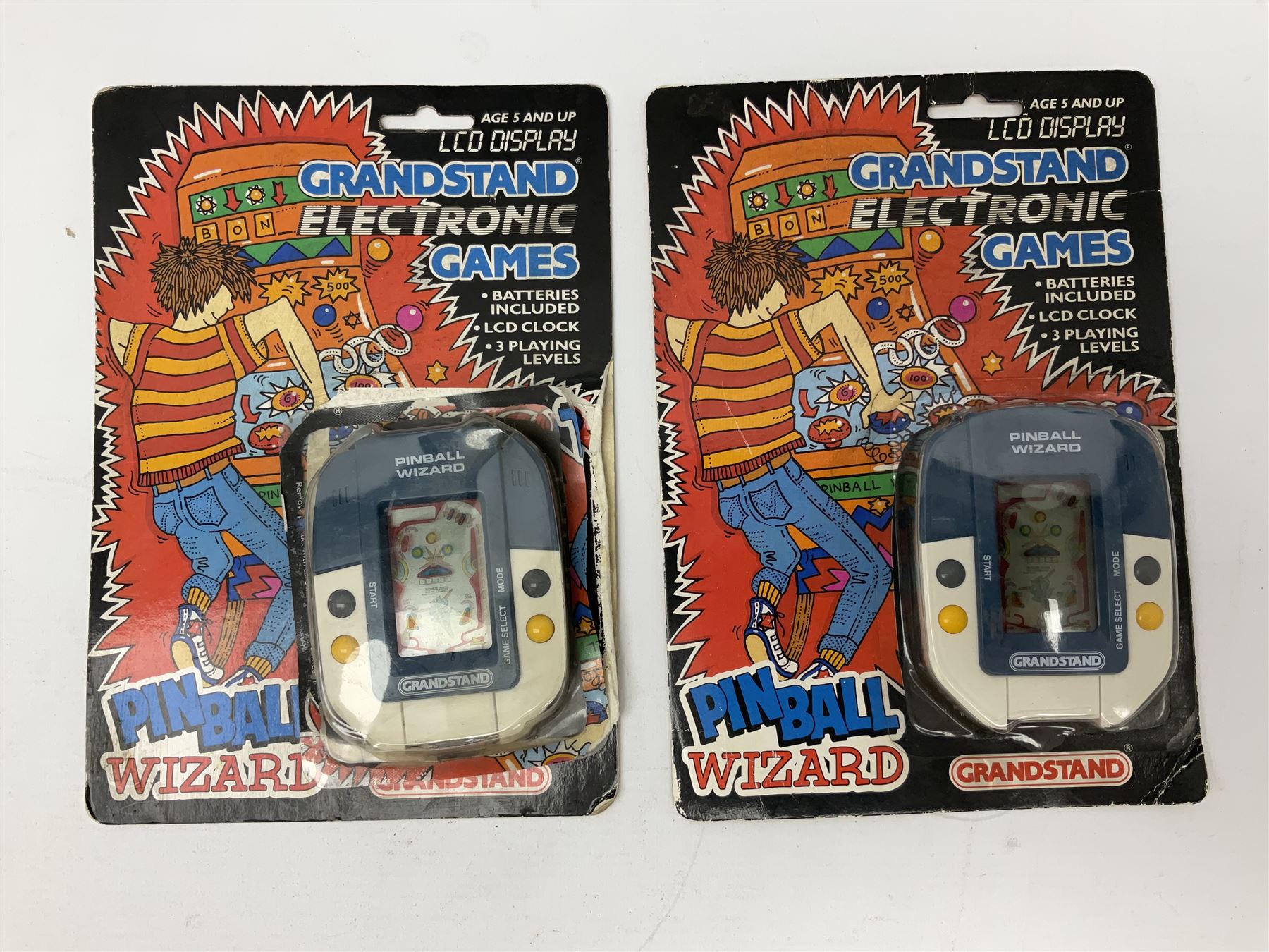 Collection of retro handheld games, including Nintendo Game & Watch ‘Snoopy Tennis’ (1982) and ‘Squish’ (1986) both with instruction booklets, Casio CG-600 ‘Star Invader’ with box, 3 in 1 LCD cartridge game including ‘Soccer’, ‘Invader’ and ‘Bomb Finder’ games, and two Grandstand ‘Pinball Wizard’ (1988) games, both with original boxes