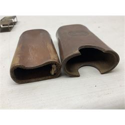 Victorian leather cigar protector with metal match striking plate on the end and internal spring to hold the cigars in place; expands for differing lengths of cigar, minimum L12.5cm; another similar leather cigar case marked Middlemore's Patent with attached vesta case and striker; three Bryant & Mays tin-late matchbox holders including 1935 Jubilee; and small box of matches (6)