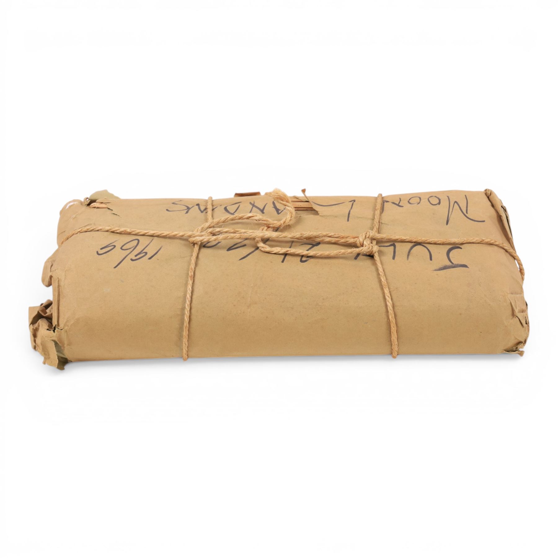 Moon Landing newspapers dated July 21st & 22nd 1969, wrapped in a brown paper package for Arthur C. Clarke by his brother and never opened
Notes: On July 20th 1969 Arthur C. Clarke appeared as a commentator for CBS News alongside Walter Cronkite during the Apollo 11 moon landing broadcast. This item is from the private collection of Arthur C. Clarke's brother.