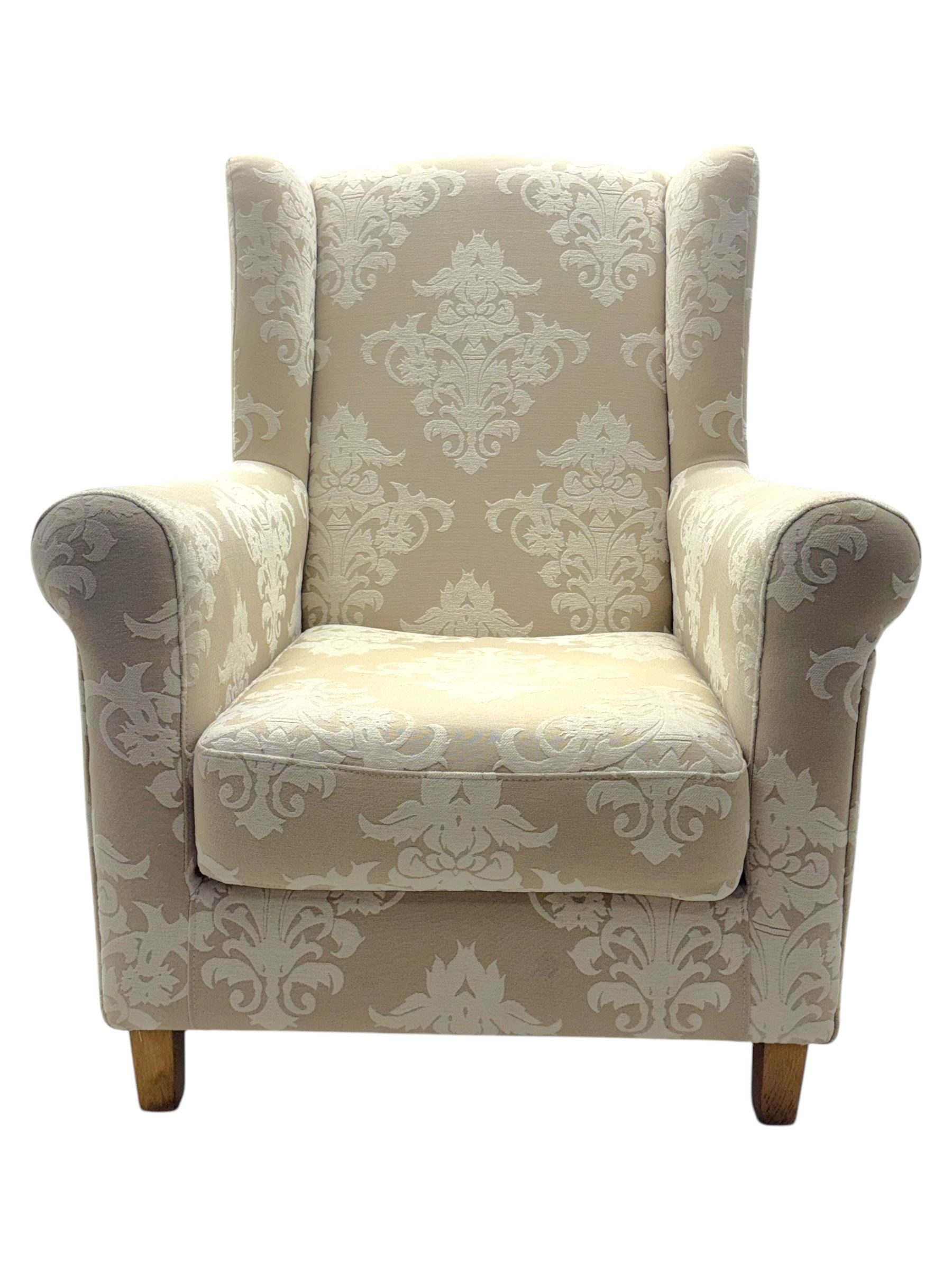 Chatsworth hardwood-framed armchair upholstered in cream  damask, with rolled arms and cushioned seat, raised on square tapered feet